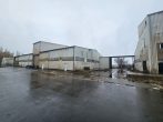 Industrie- und Gewerbeareal mit vielen Bestandsgebäuden - Bild