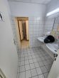 Werkstattfläche/ Warmlagerhalle auf eingezäuntem GS, 6 Rolltore, Grün- & Freilagerfläche + SP mgl. - Bild