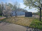 Werkstattfläche/ Warmlagerhalle auf eingezäuntem GS, 6 Rolltore, Grün- & Freilagerfläche + SP mgl. - Bild