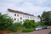 Freistehendes MFH in Schkeuditz, gr. Grundstück, 12 WE, Balkone, Tageslichtbäder, Dachreseve - Titelbild