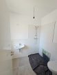 Privatoase mit modernem Neubaukomfort in ruhiger Lage mit Garten und nah am Goitzschesee - Gäste-WC mit Dusche