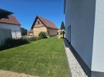 Privatoase mit modernem Neubaukomfort in ruhiger Lage mit Garten und nah am Goitzschesee - Bild