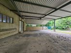 Ca. 2500 m² eingezäuntes gr. GS mit Bestand: Büro-/Wohngebäude, Halle m. Rolltoren, Lager/Freilager - Bild