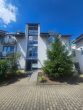 Lichtdurchflutete 1-R-ETW mit offenem Küchen- und Wohnbereich mit EBK & Balkon, TG-SP mgl. - Bild