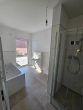 Privatoase mit modernem Neubaukomfort in ruhiger Lage mit Garten und nah am Goitzschesee - Bad