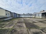 192,31 €/m² - Bestand u.a. aus Hallen, Garagen, Büros, Sozialräumen u.v.m. (ca. 13.000 m² NF) auf ca. 3,3 ha GS, ca. 89 SP - Bild