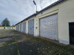 GS mit Bestand aus Hallen, Garagen, Büros, Sozialräumen u.v.m. auf ca. 3,3 ha GS, ca. 89 SP - gr. Garagen