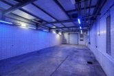 GS mit Bestand aus Hallen, Garagen, Büros, Sozialräumen u.v.m. auf ca. 3,3 ha GS, ca. 89 SP - KI-generiert